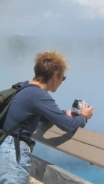 Ann Barbara snapping the mists of a Yellowstone thermal area.Patience, this 346×259 image (49 KB) may take a while to load.