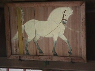 Sacred painting of a white horse.