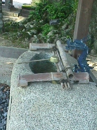A purification well, Rokusho Jinja.